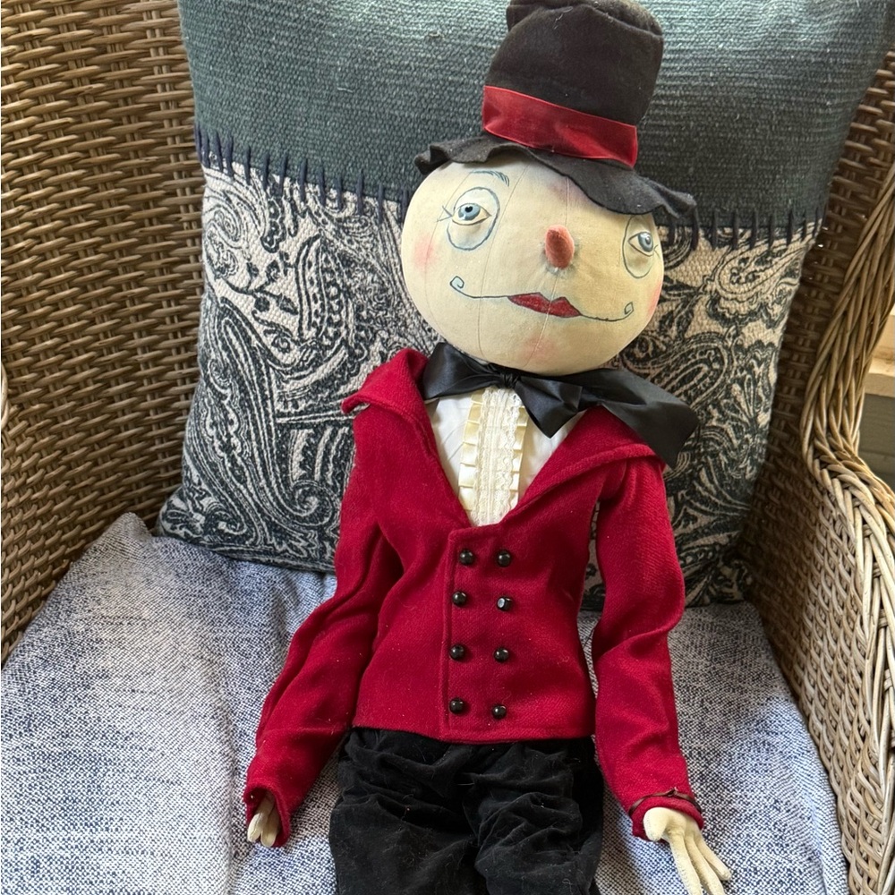 Joe Spencer Snowman doll dressed in his finest.